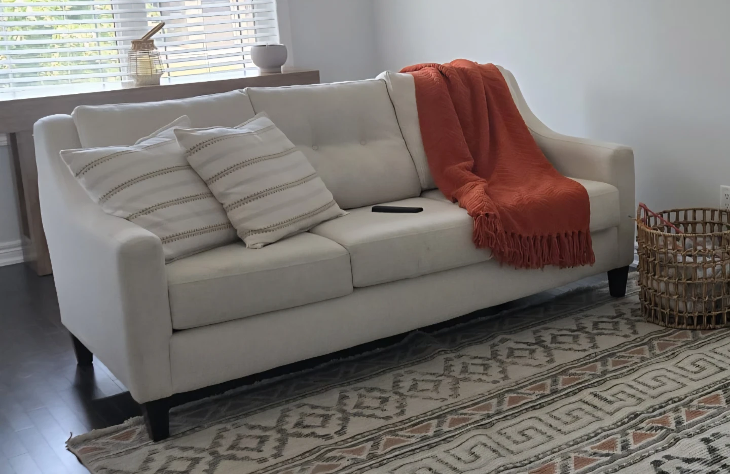 Cream Sofa with Throw Blanket and Pillows - photo 2