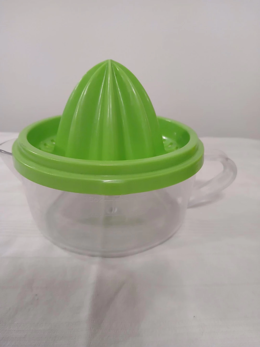 Green Citrus Juicer with Pitcher. Pick up only.