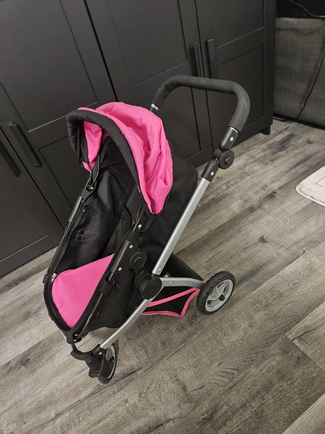 Pink and Black Doll Stroller