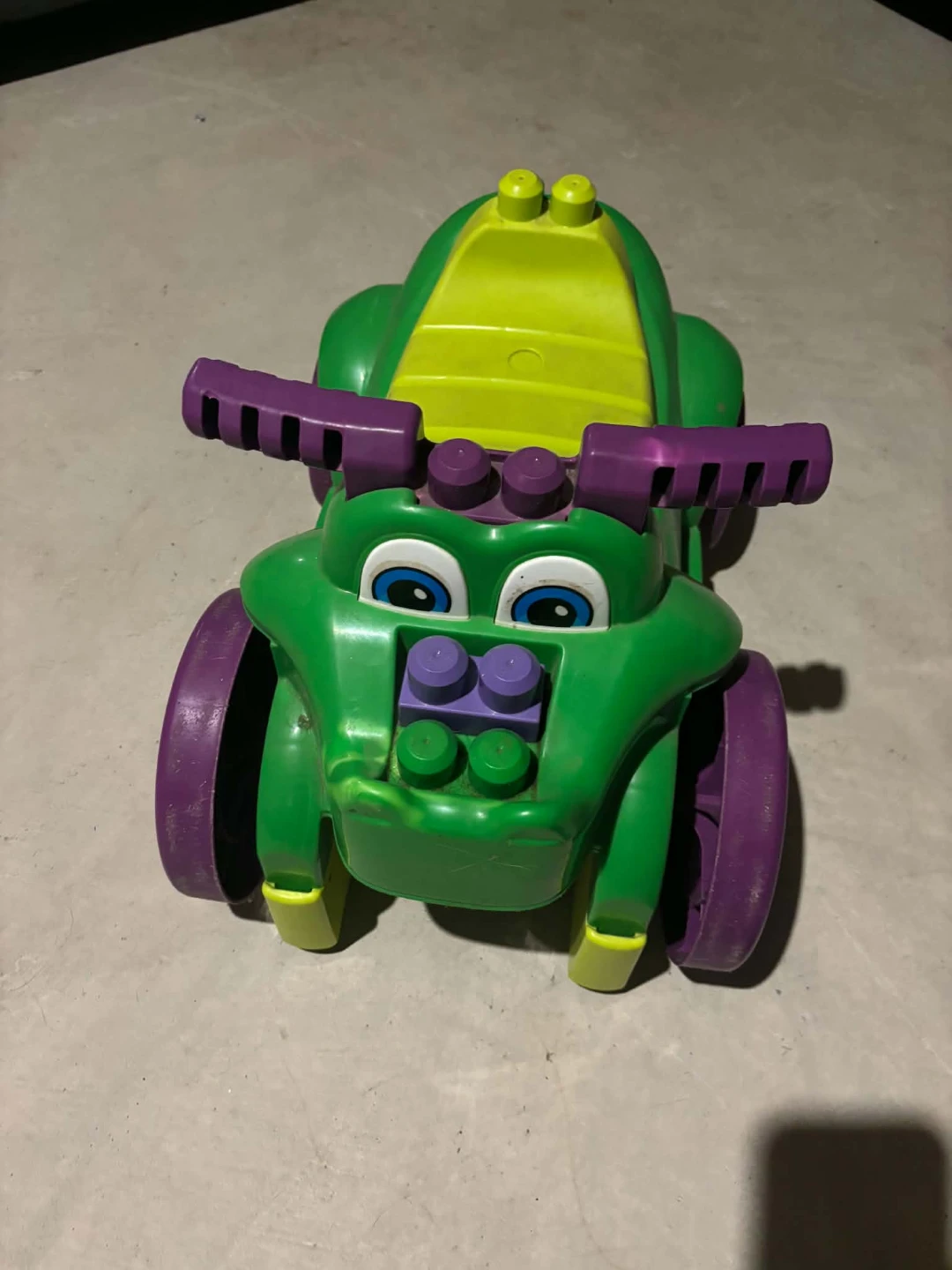 Green and Yellow Ride-On Toy Vehicle