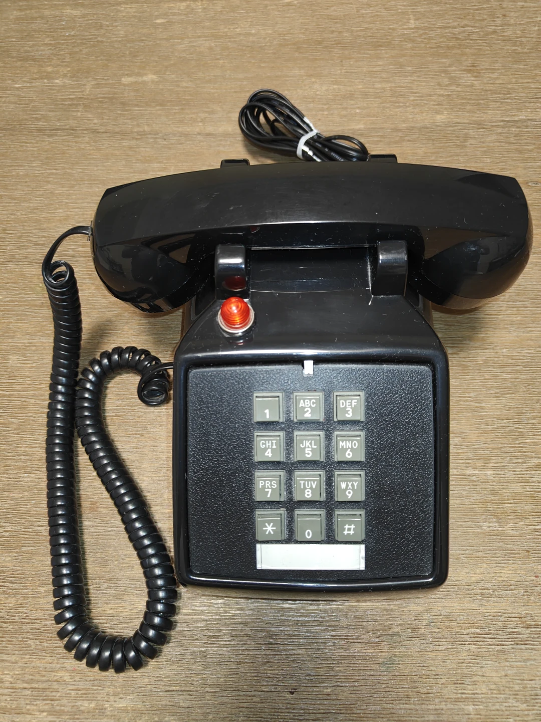 Hearing aid plane old telephone with red light notifier