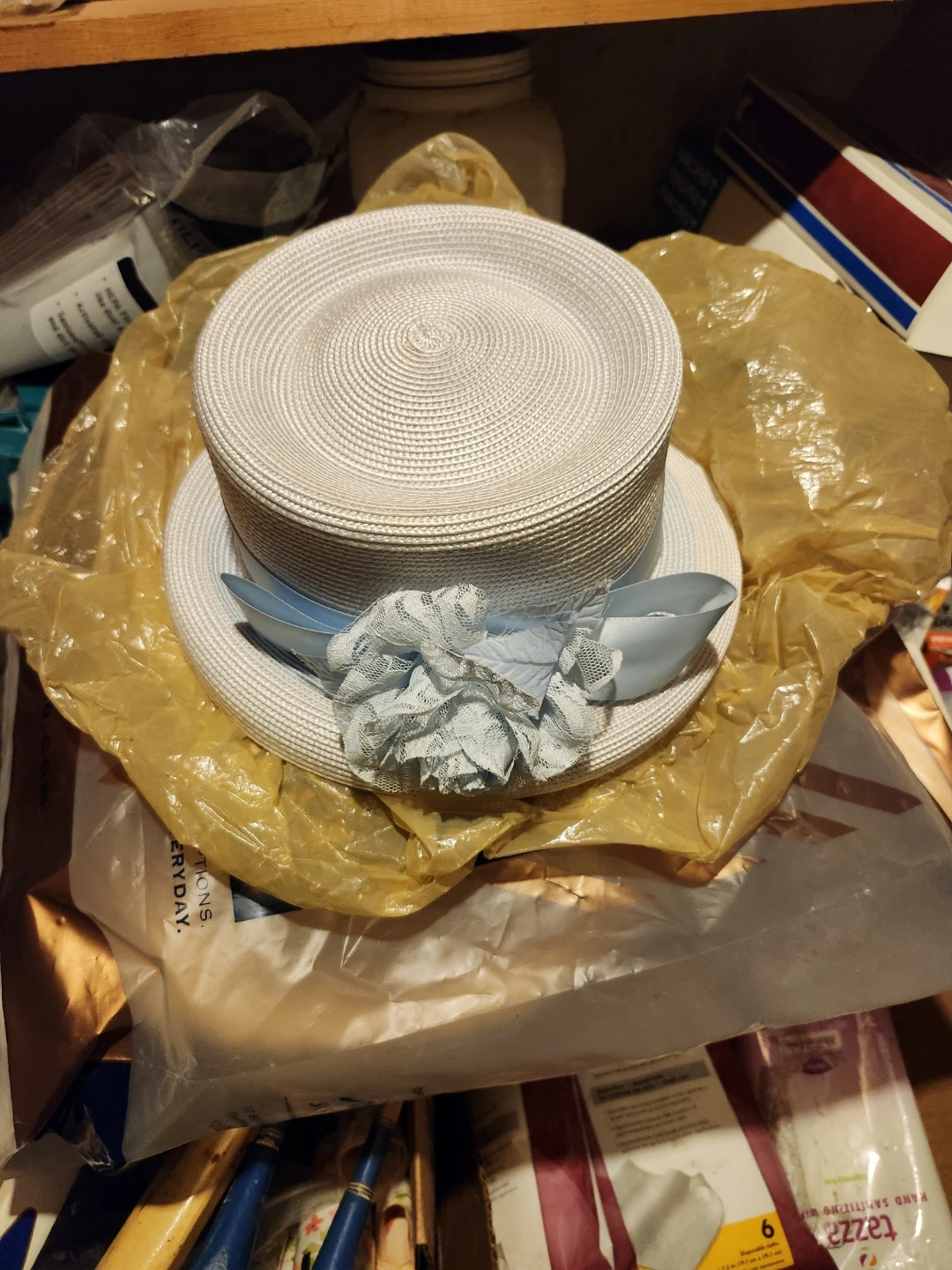 White Woven Sun Hat with Blue Ribbon and Flower