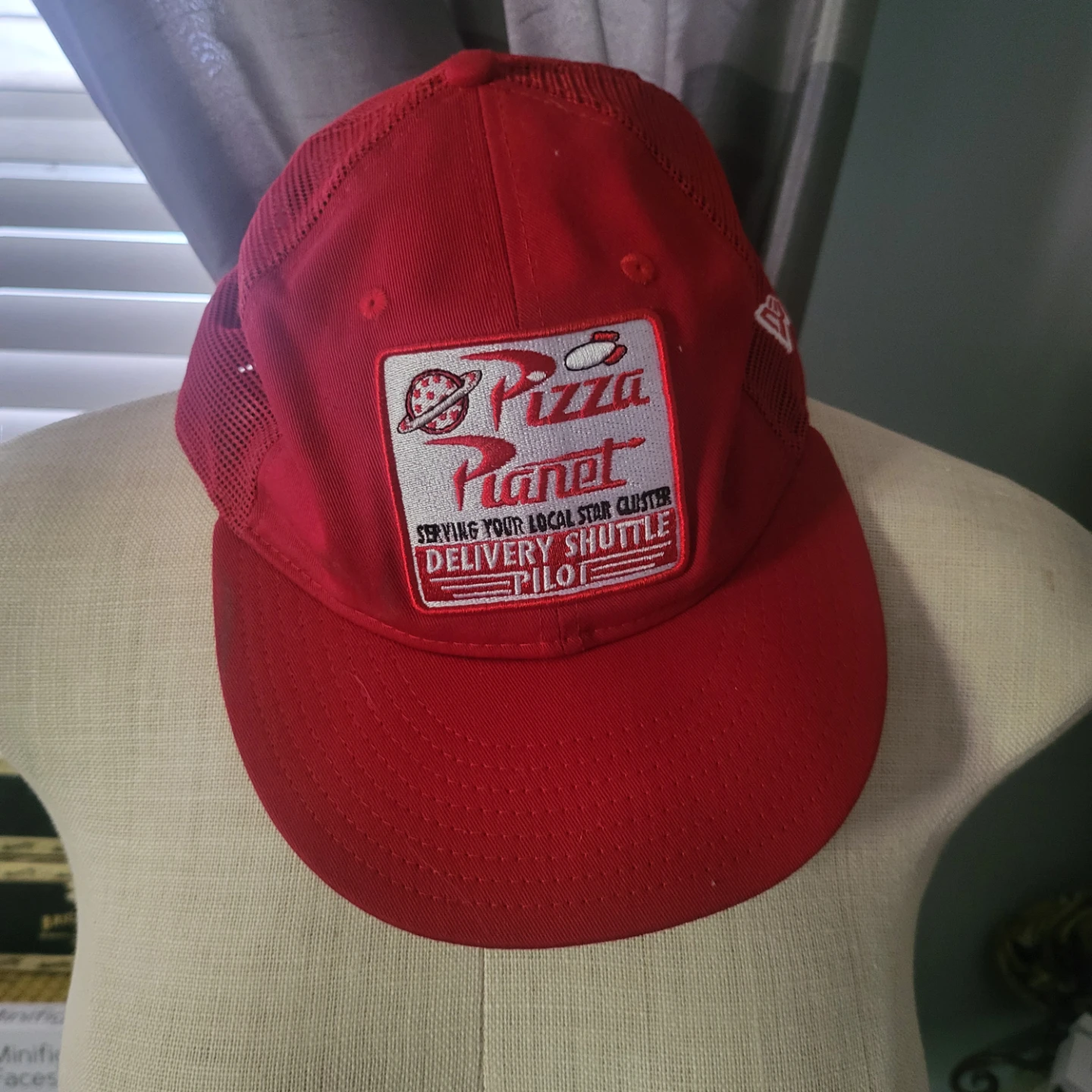 Pizza Planet Delivery Pilot Trucker Hat