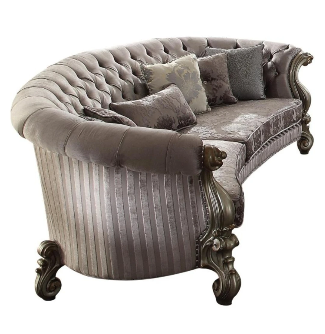 ACME Curved Tufted Sofa with Decorative Legs