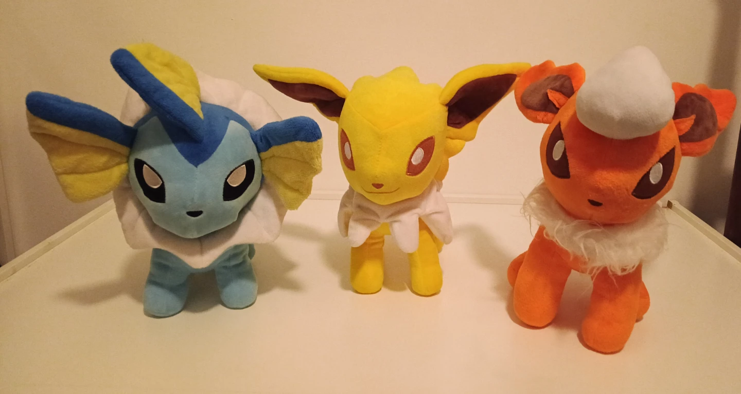 Pokemon Vaporeon Jolteon Flareon and Charmander Plush Toys