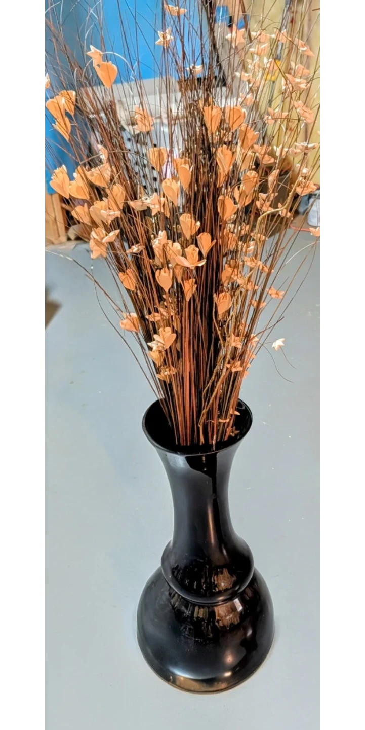 Black Vase with Decorative Branches