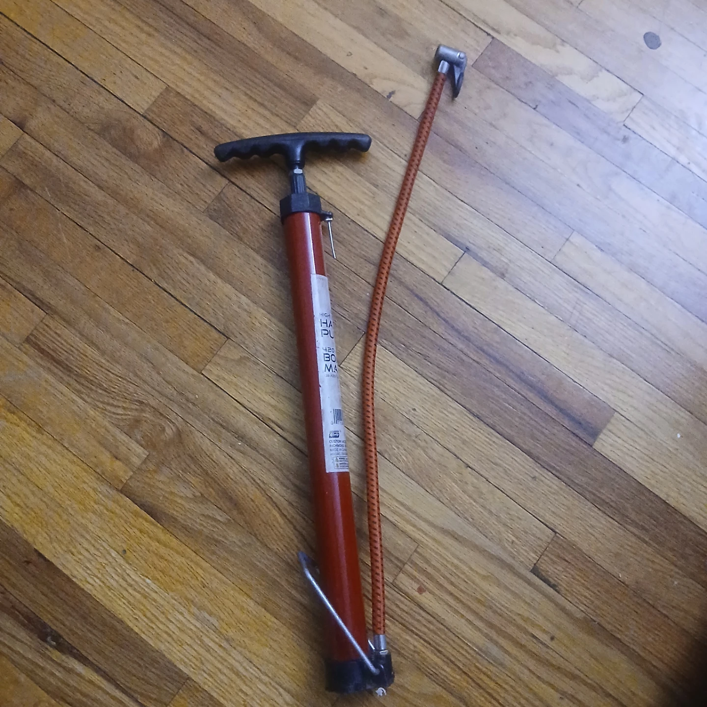 Red Hand Pump with Hose