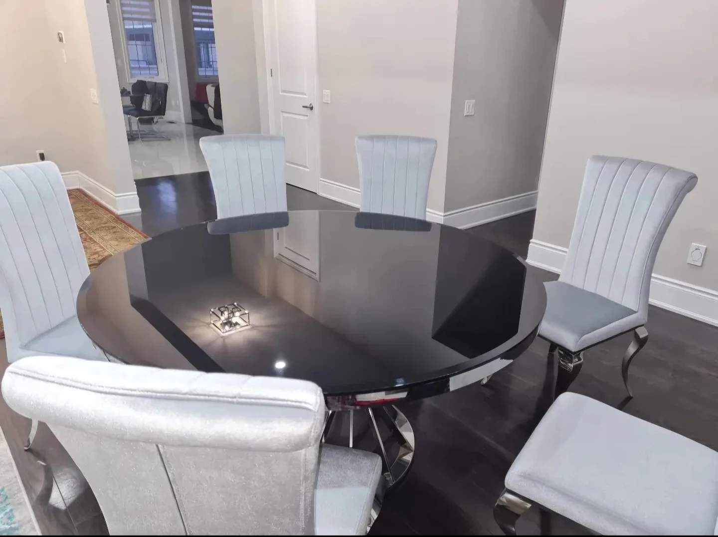 Round glass dining table with 6 chairs