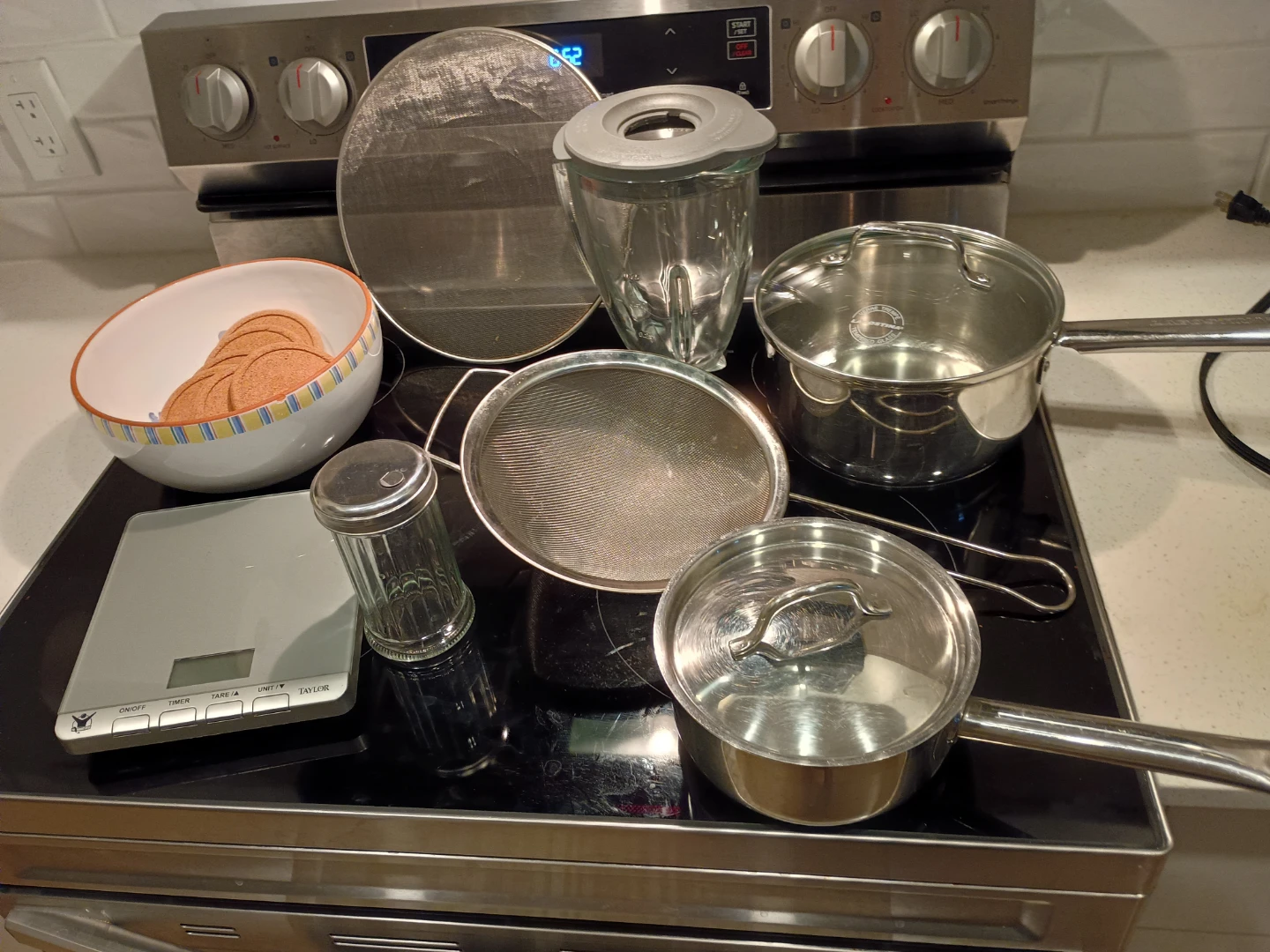 Kitchen cookware, strainer., pots, blender, scale