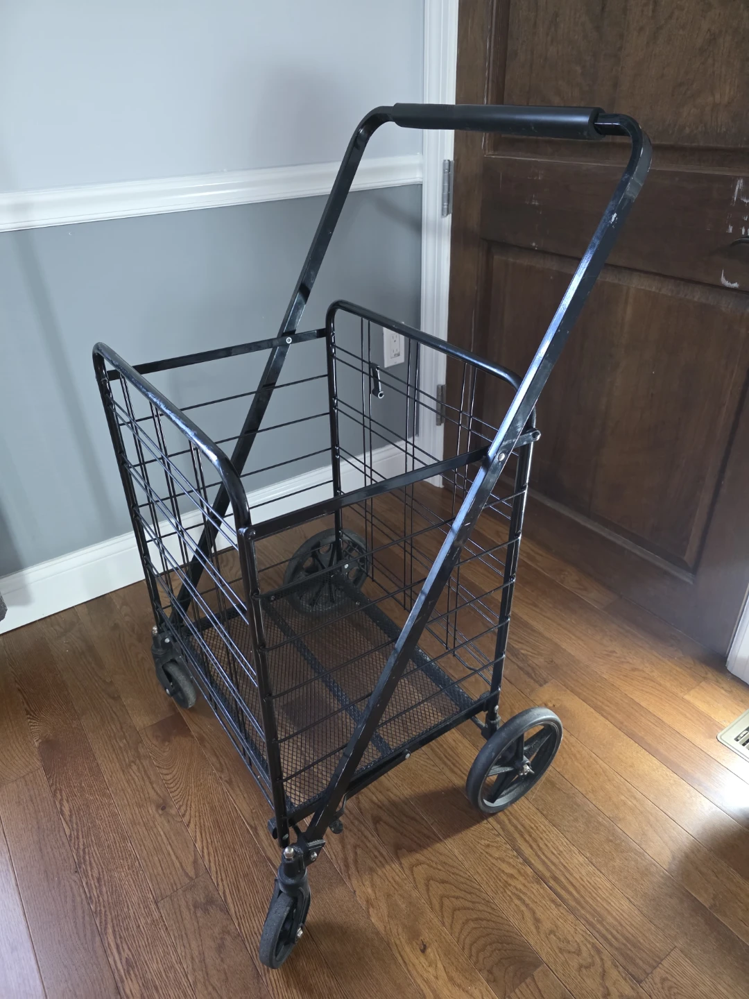 Black Metal Rolling Shopping Cart
