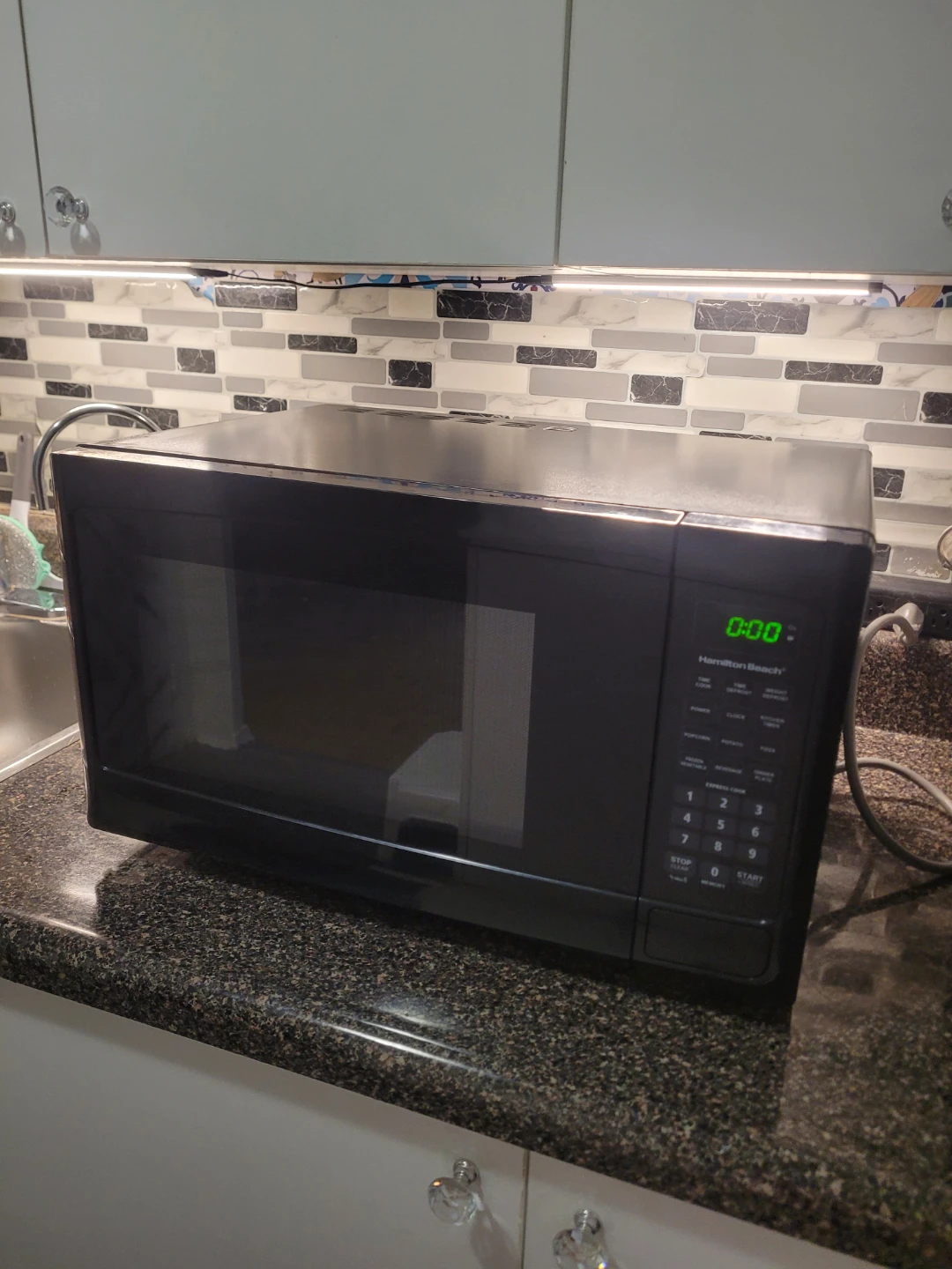 Hamilton Beach Black Microwave 1.1 cubic almost new $65