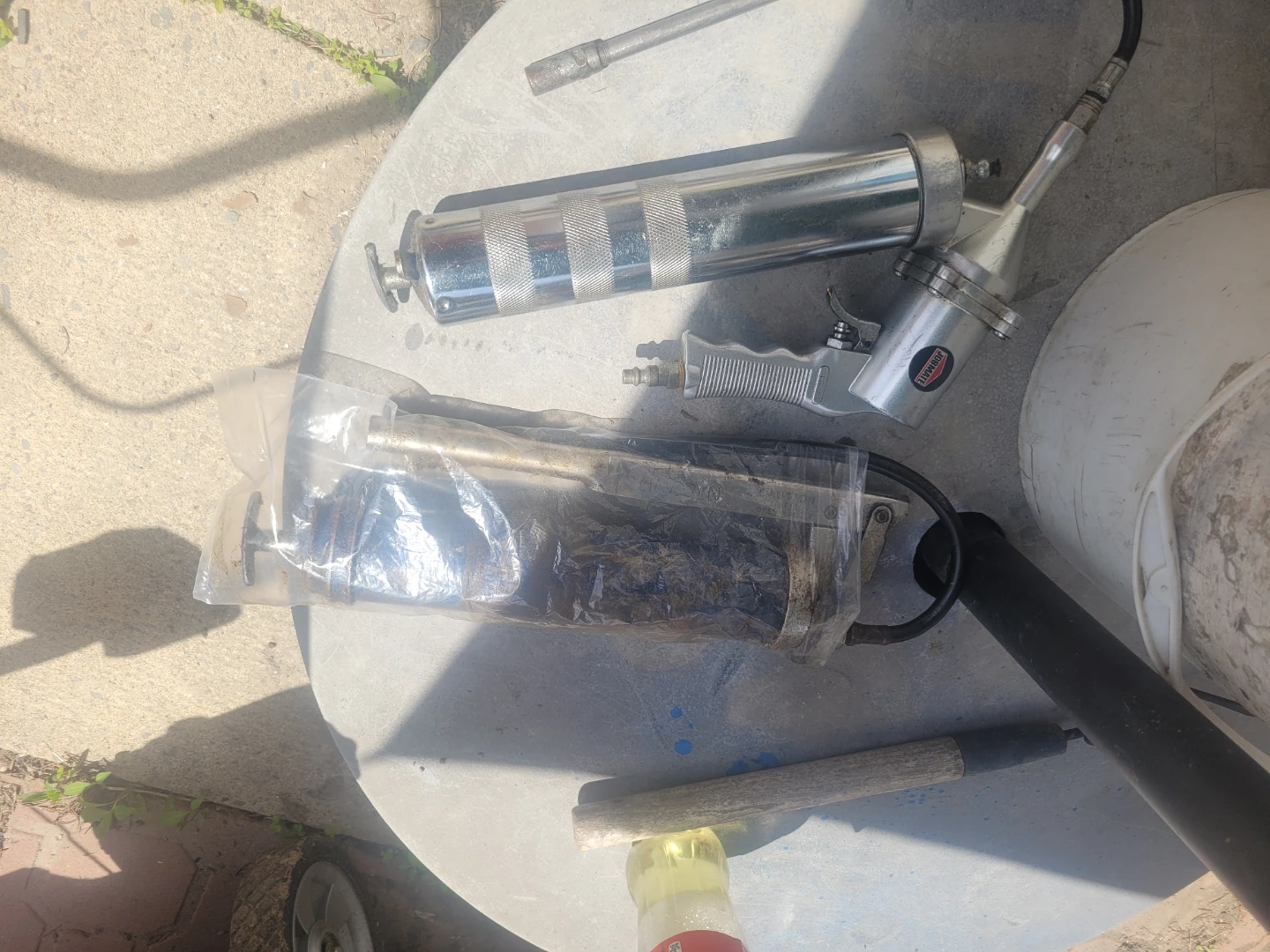 2 Pistol Grease Gun 1 Air Grease Gun and 1 manual