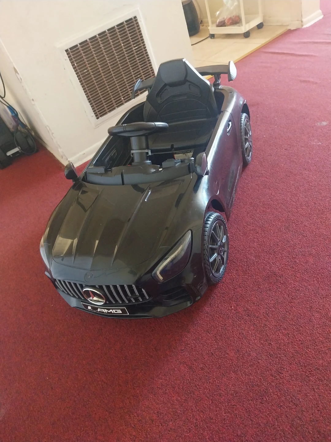 Black Mercedes-Benz AMG Ride-On Car