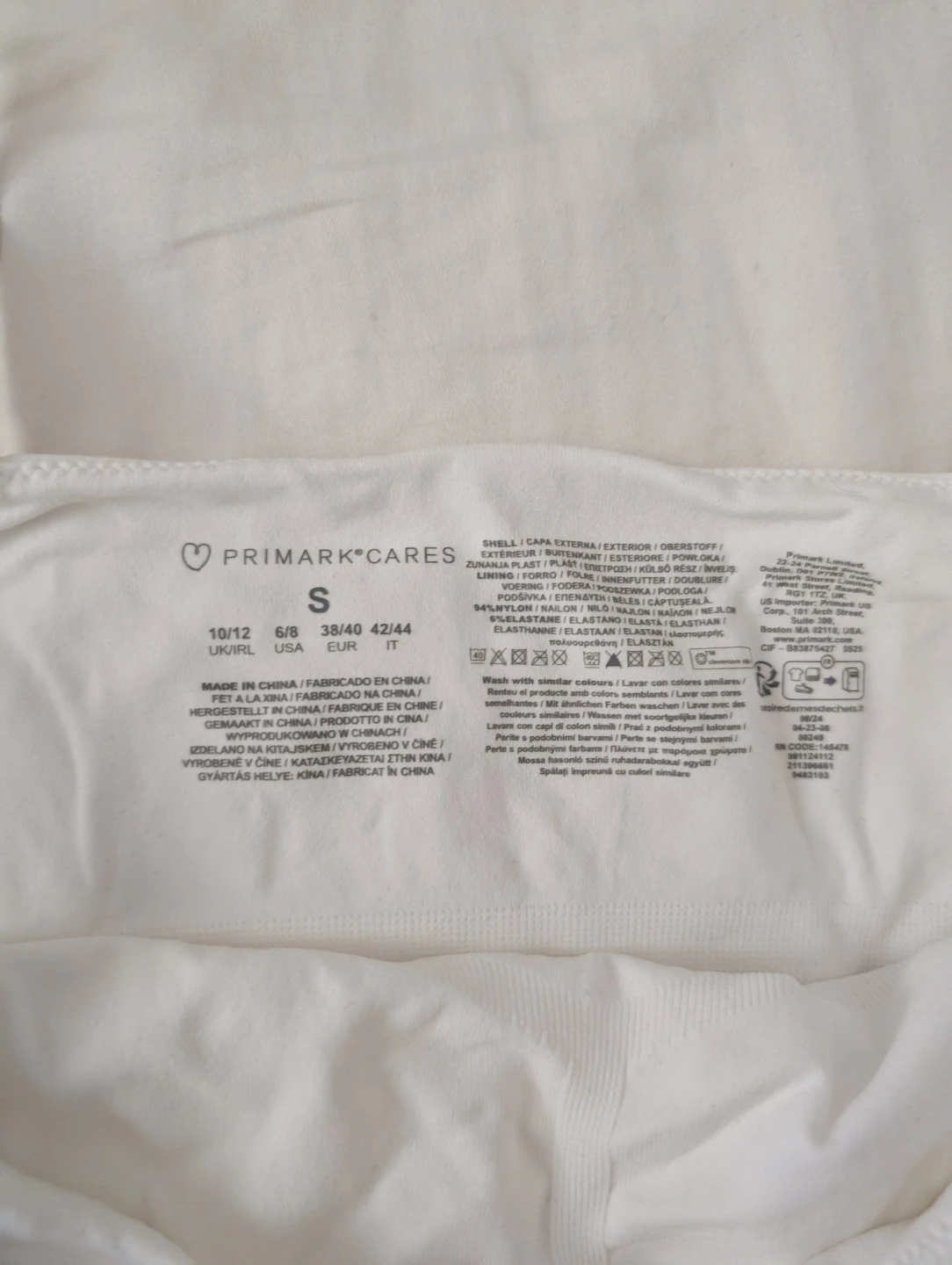Primark Cares White Seamless Crop Top piled at the side - photo 2
