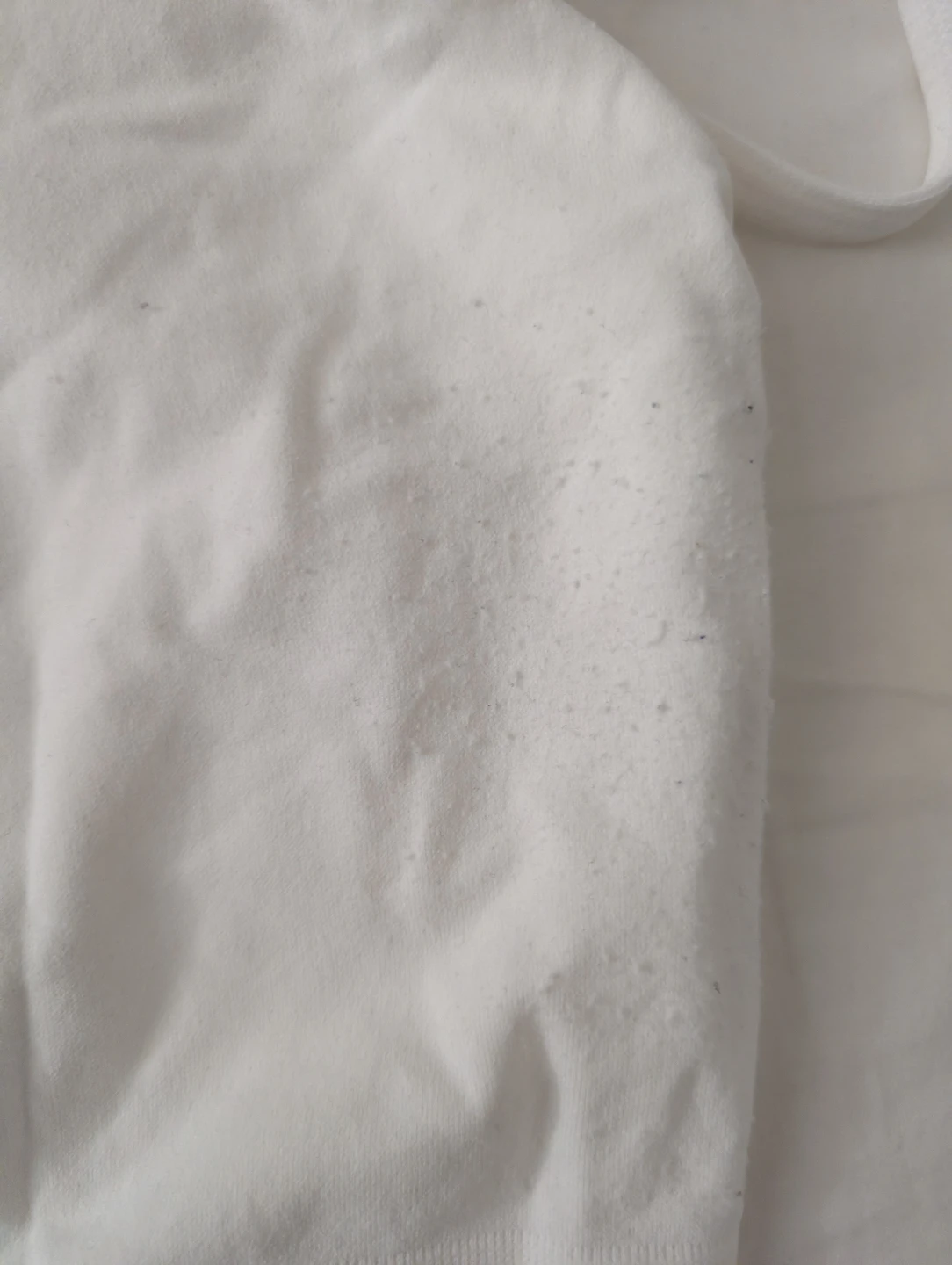 Primark Cares White Seamless Crop Top piled at the side - photo 3