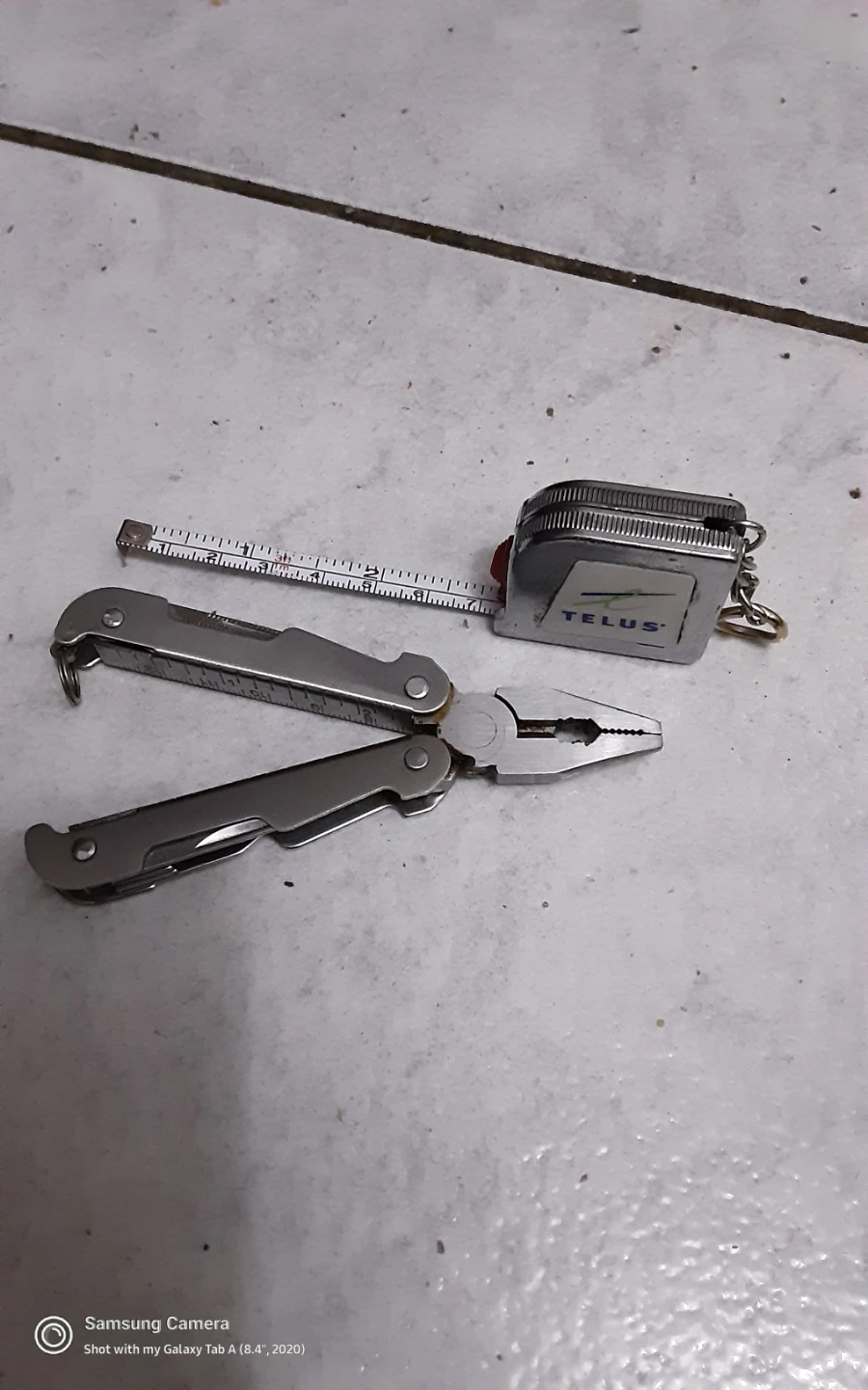 Multi-tool and TELUS Tape Measure