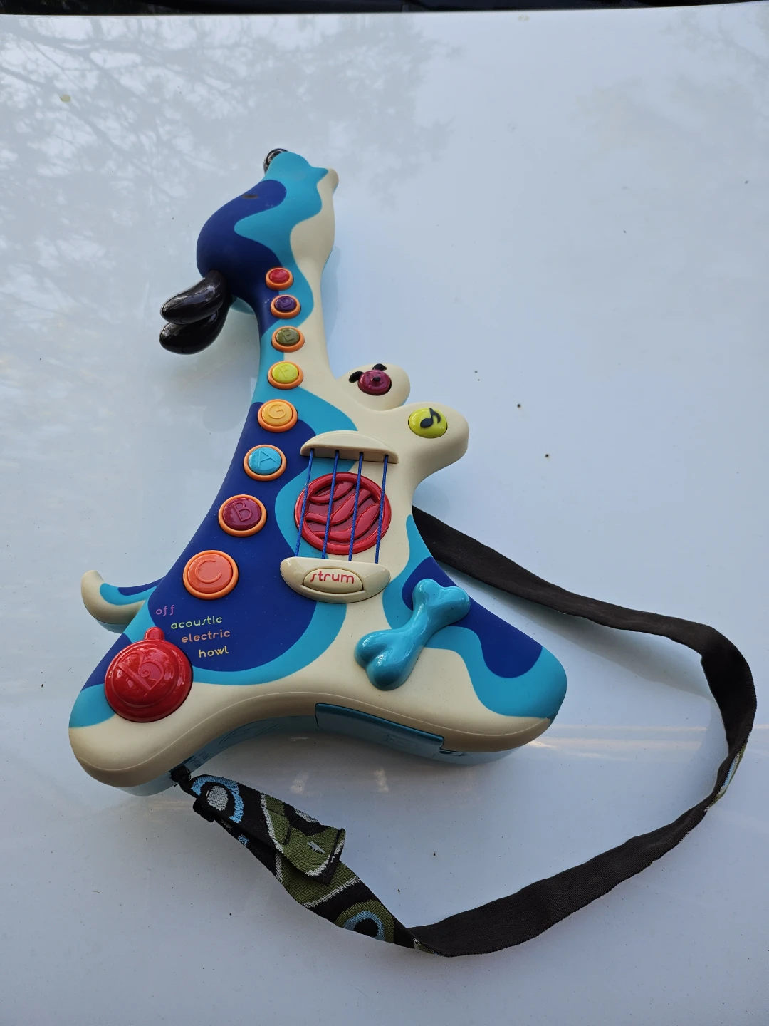 B. Toys Giraffe Toy Guitar