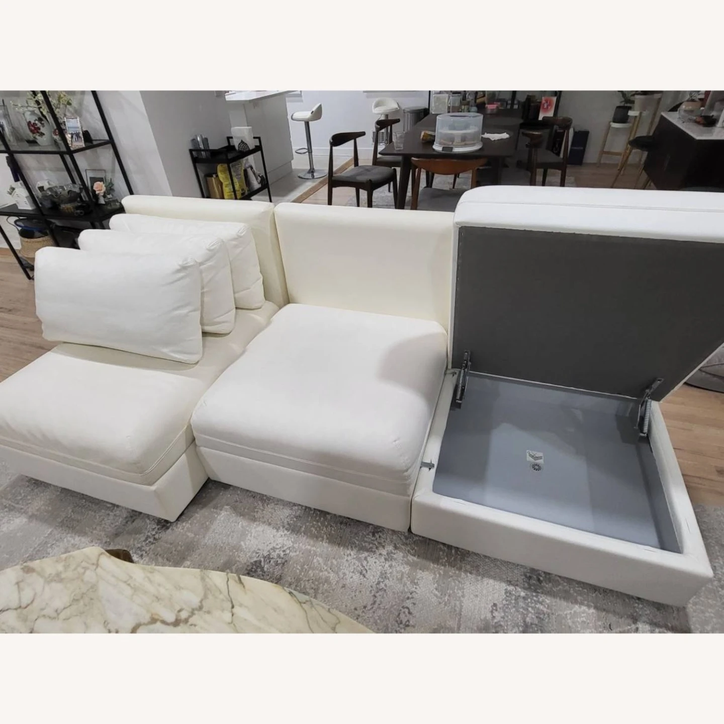 White sectional sofa with storage
