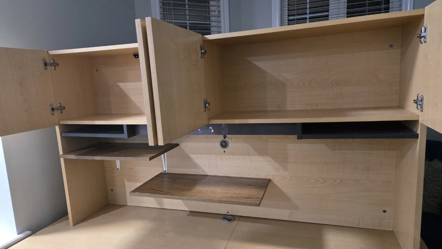 L-shaped desk with hutch and cabinets
