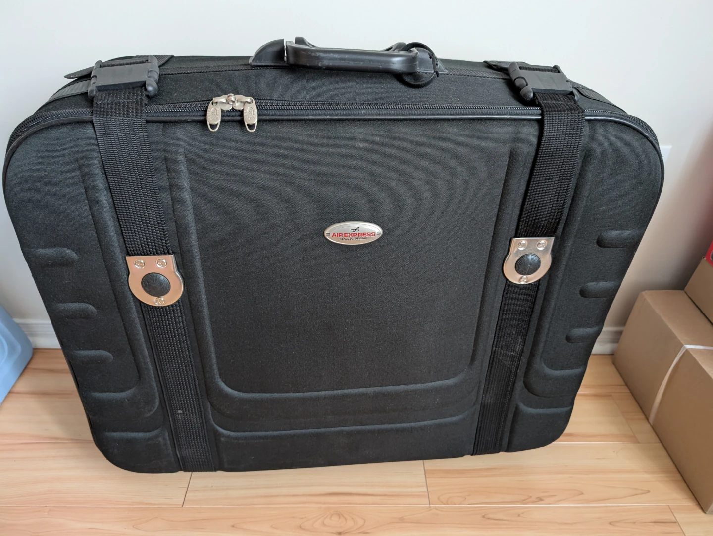 Air Express Black Rolling Suitcase