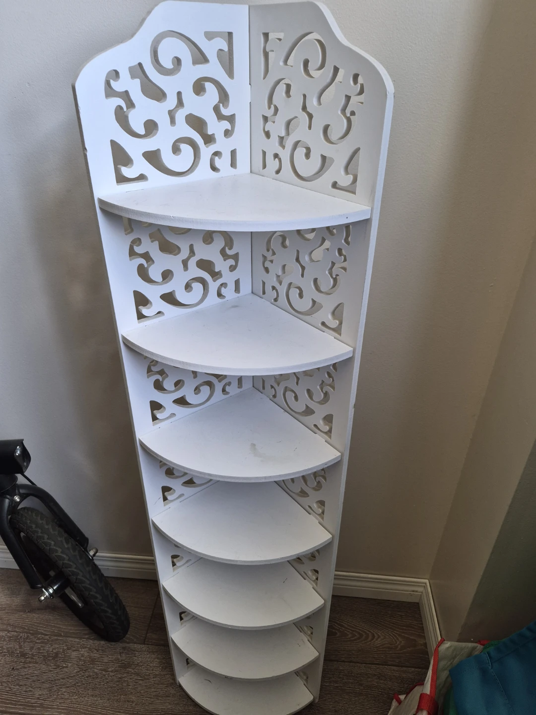 White Corner Shelf Unit with Ornate Cutouts