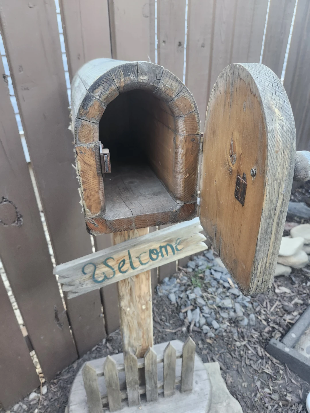 Wooden Mailbox with "Welcome" Sign