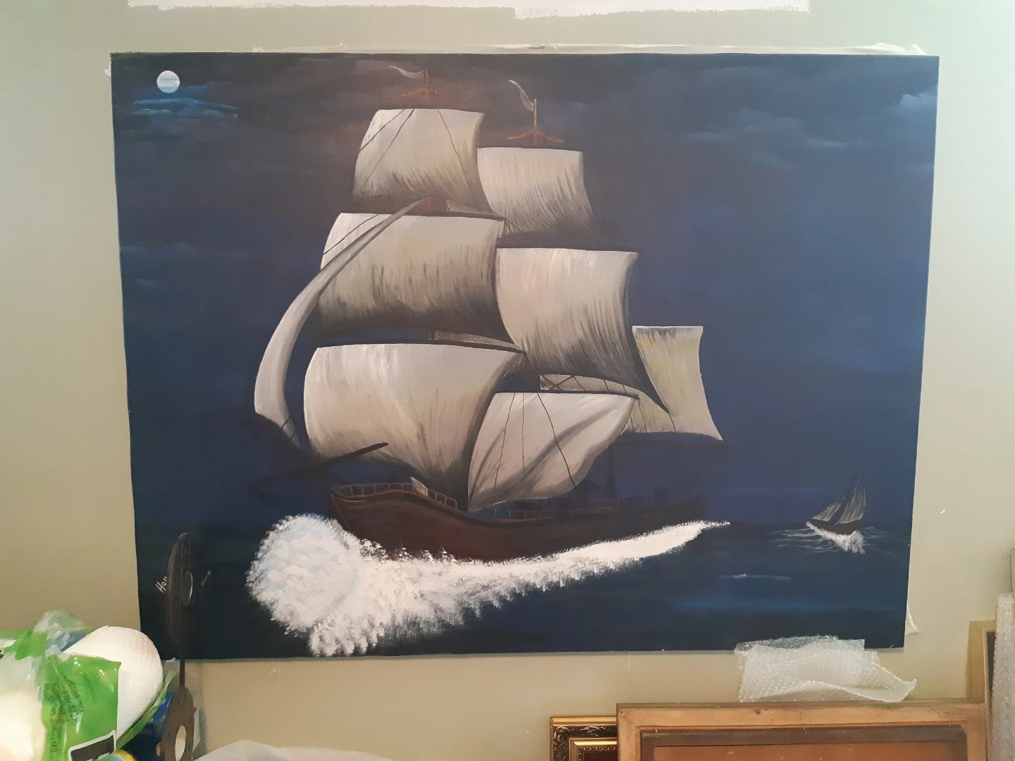Painting of a tall ship at sea