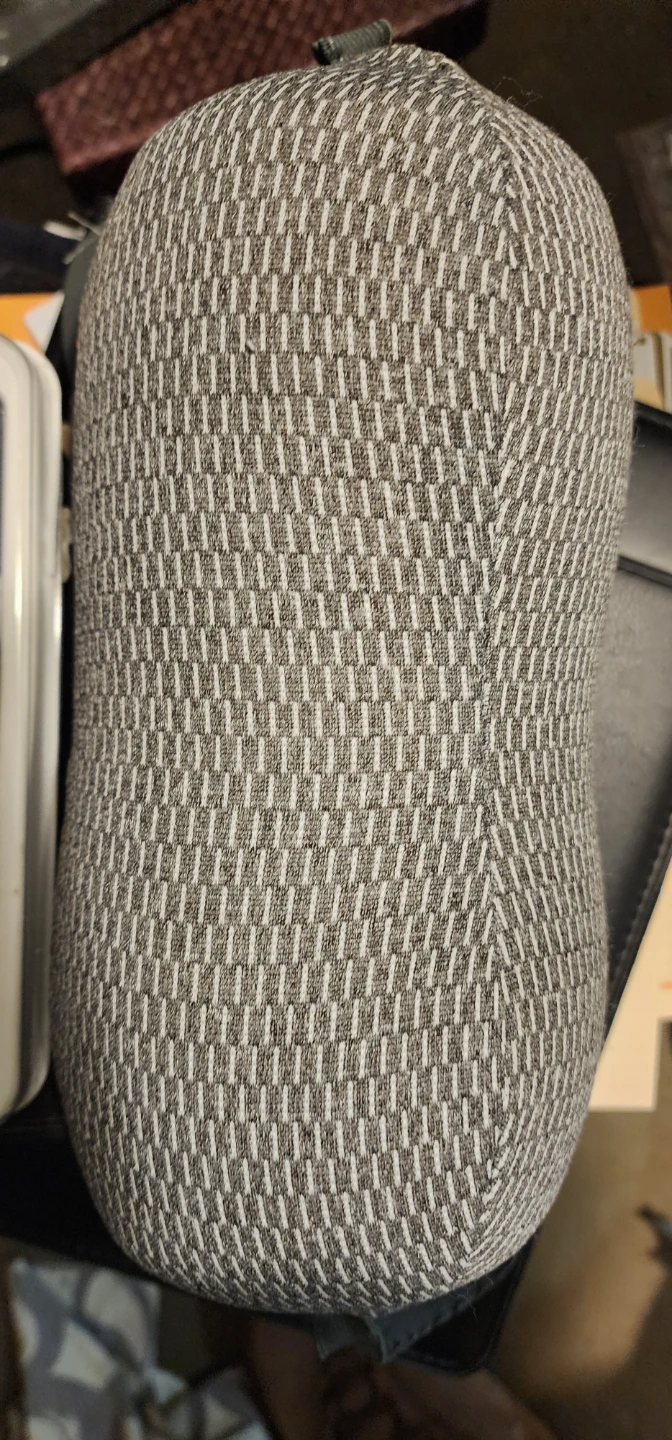 Grey and white patterned IKEA neck pillow