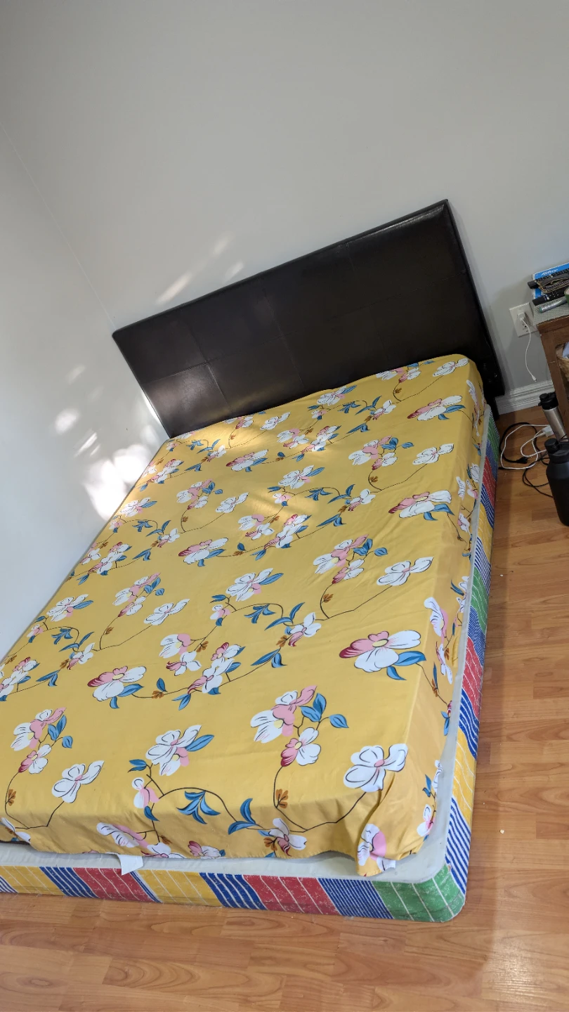 Queen Size Faux Leather Headboard with Floral Bedding
