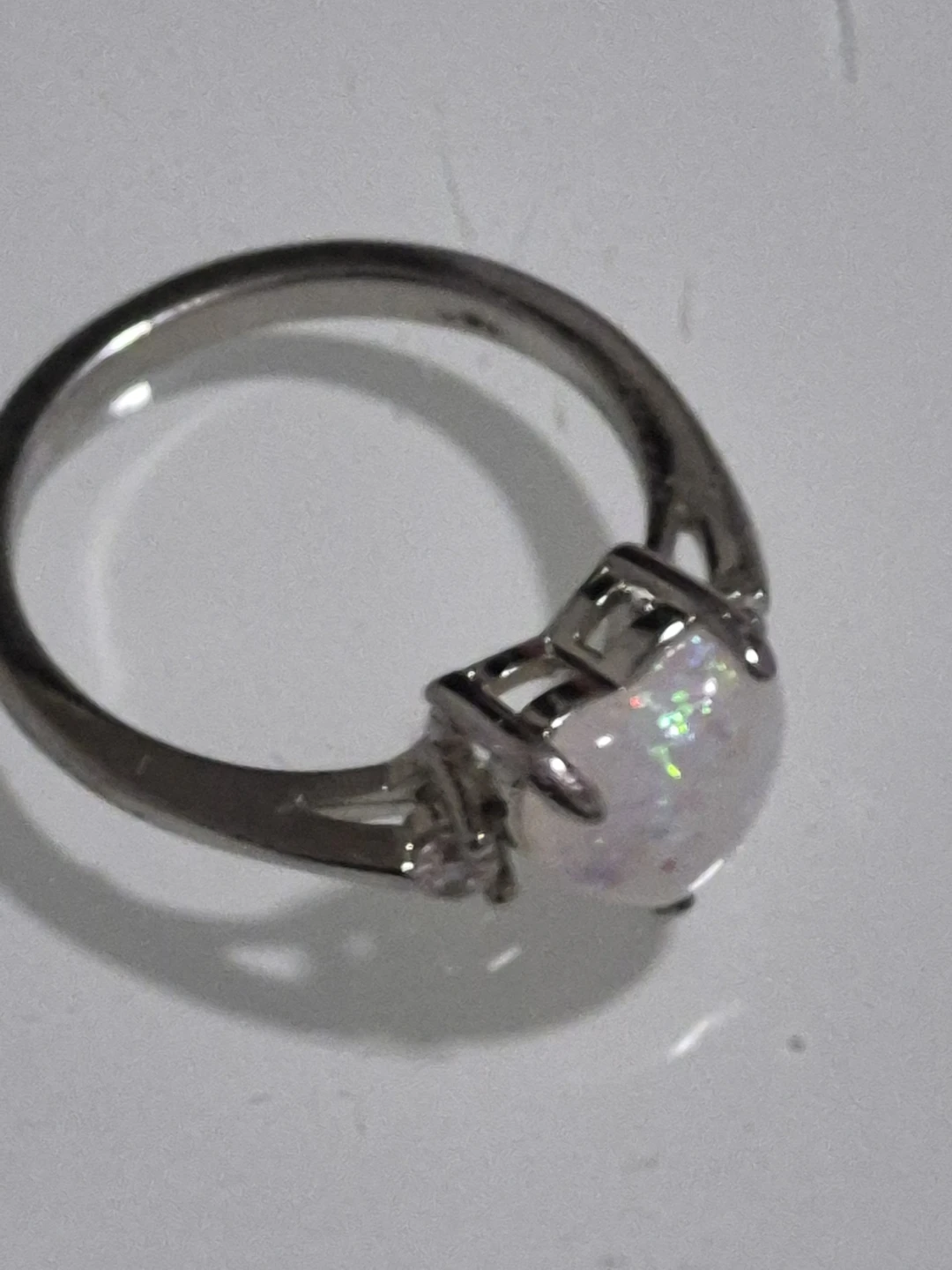 Silver-tone ring with opal stone