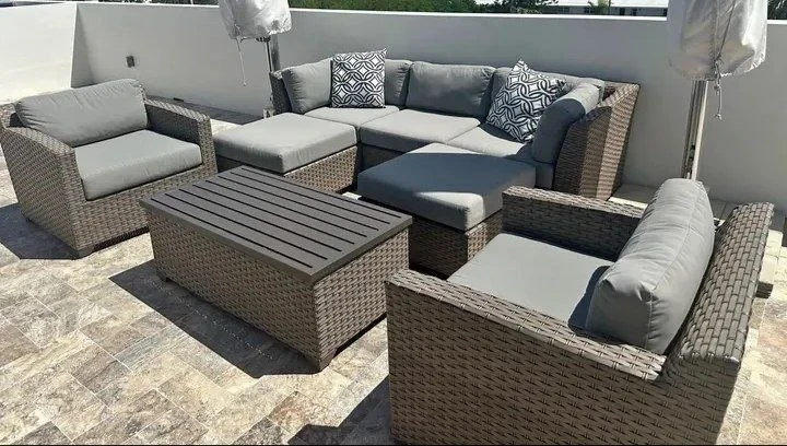 Sectional outdoor couch with table and ottoman