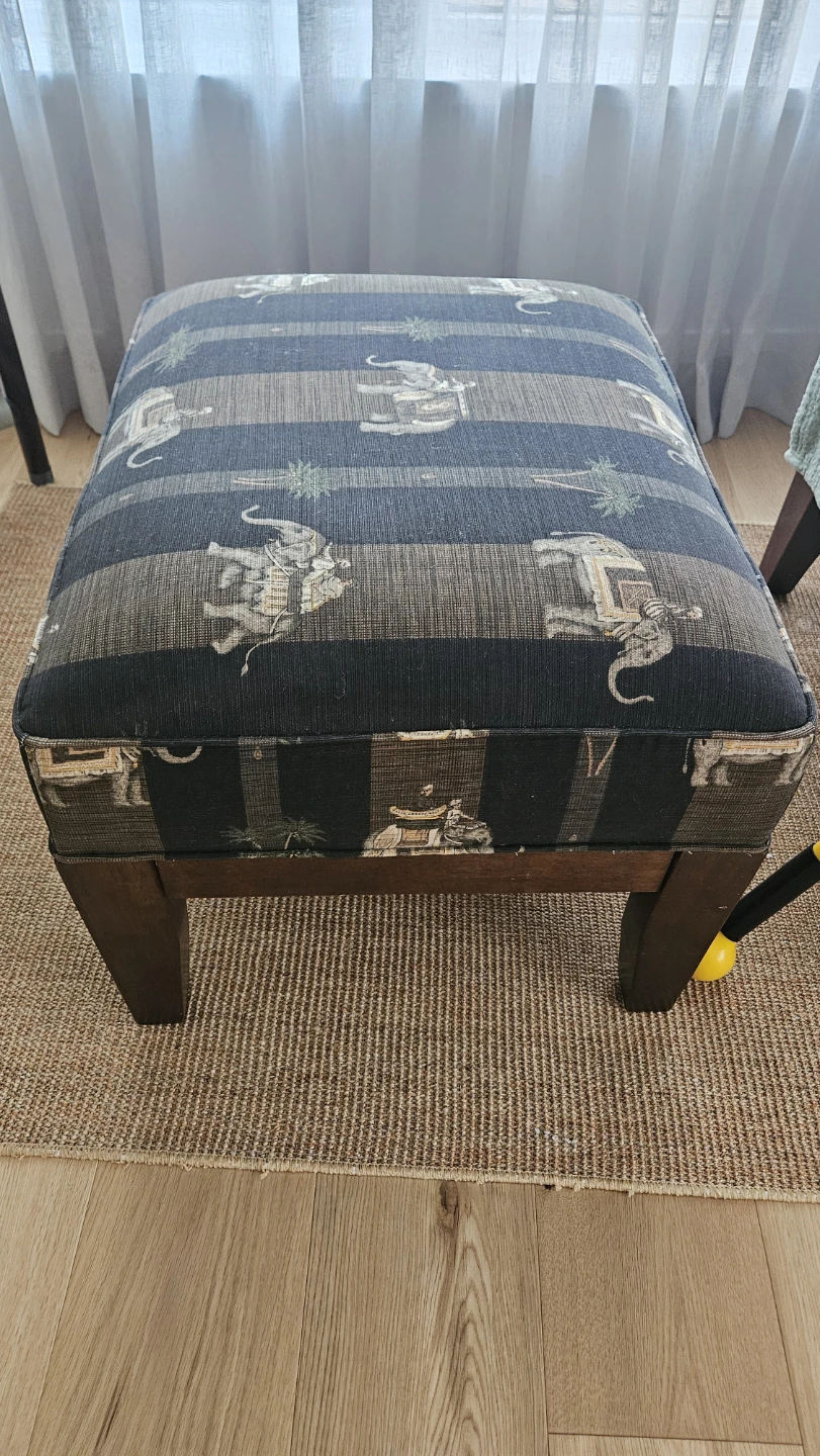 Armchair and ottoman with elephant pattern