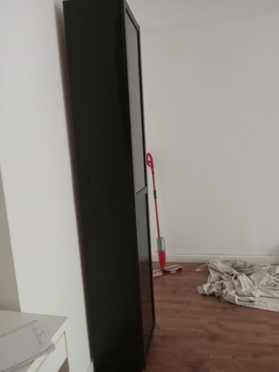 Tall black shelving unit