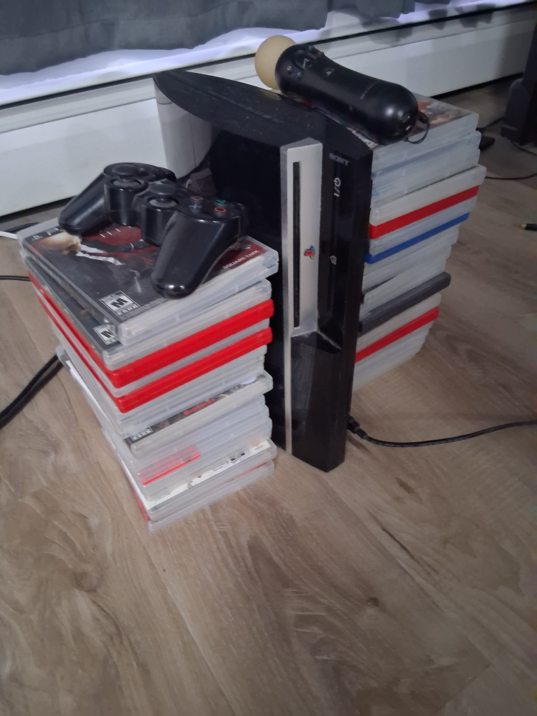 Sony PlayStation 3 Console with Games and Controllers