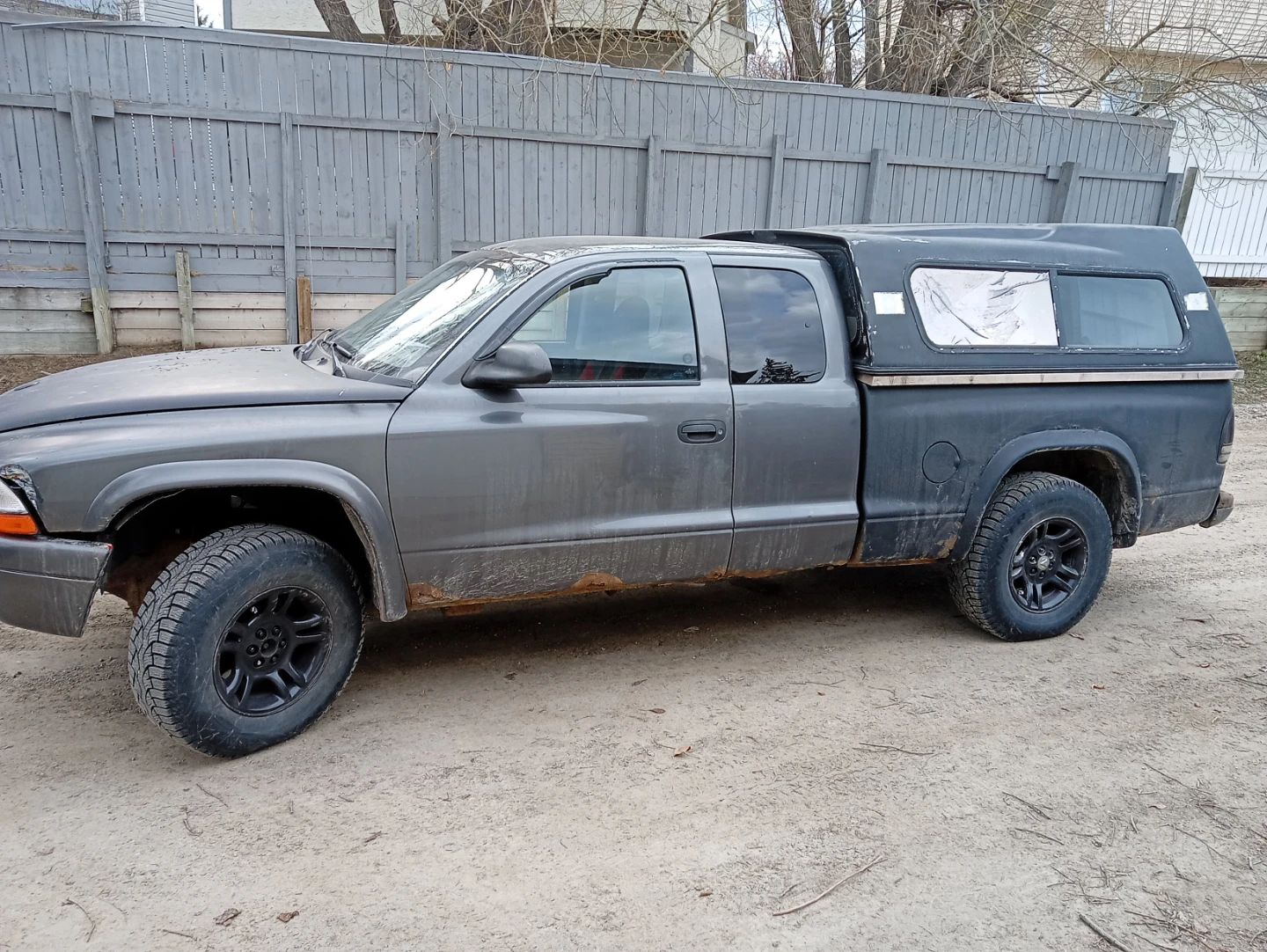 Grey Dodge Dakota Quad Cab Truck with Camper Shell - photo 2