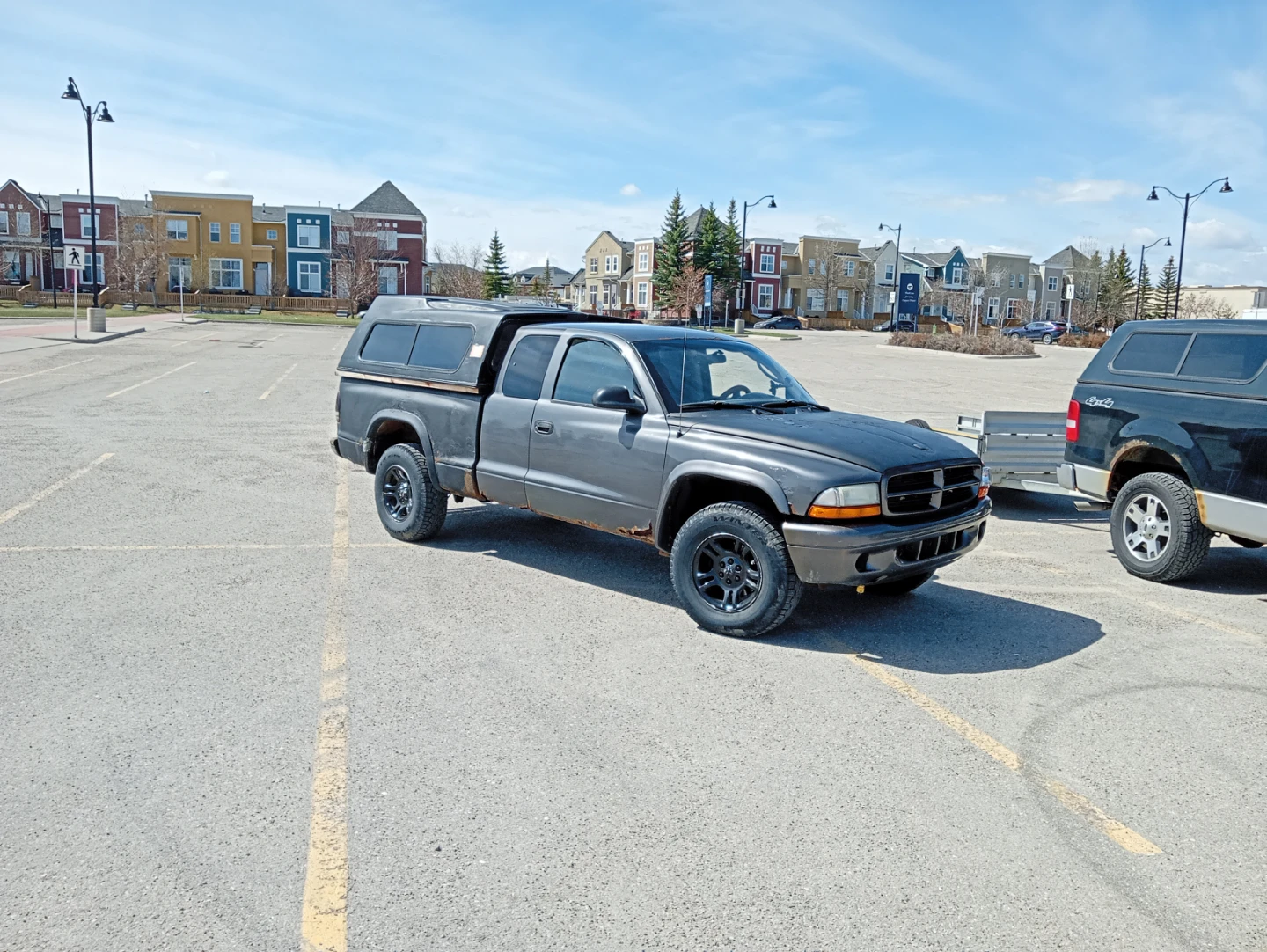 Grey Dodge Dakota Quad Cab Truck with Camper Shell - photo 3