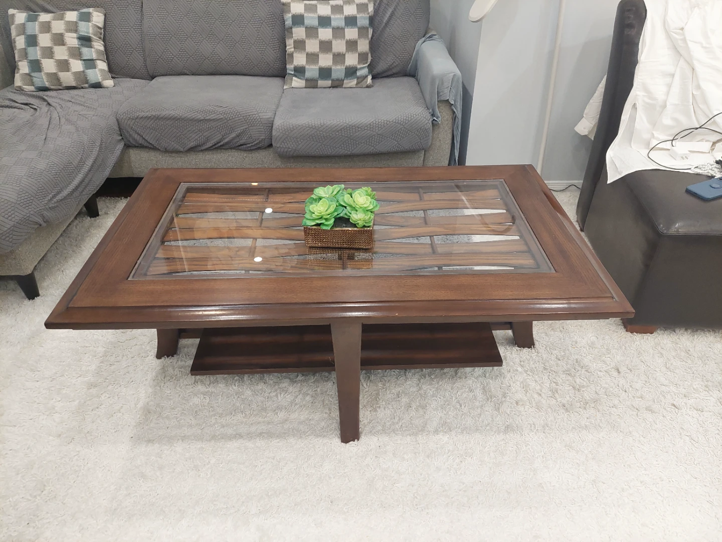 Wooden coffee table with glass top