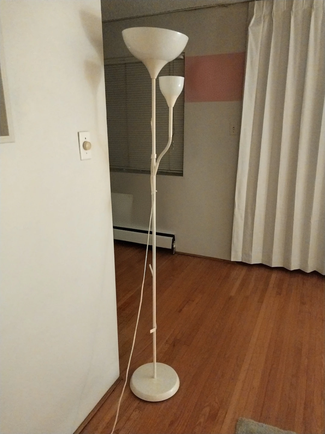 White dual-head floor lamp