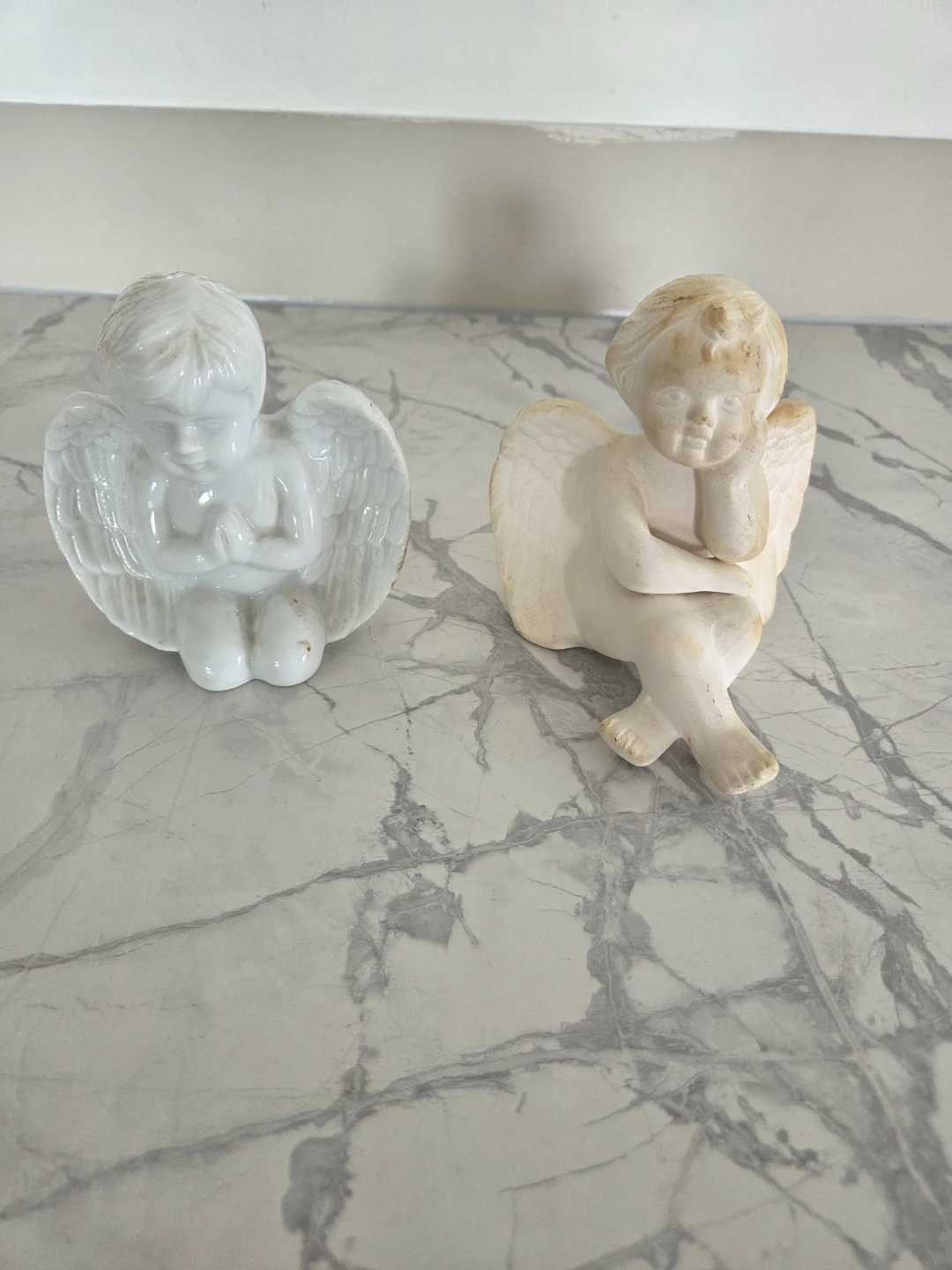 Two Cherub Figurines
