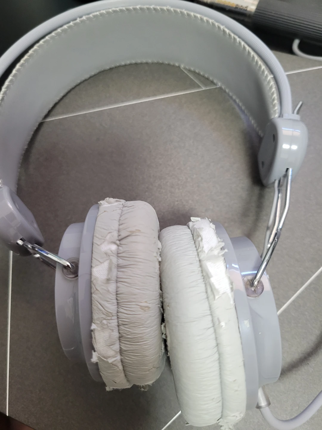 Grey On-Ear Headphones - natural storage wear