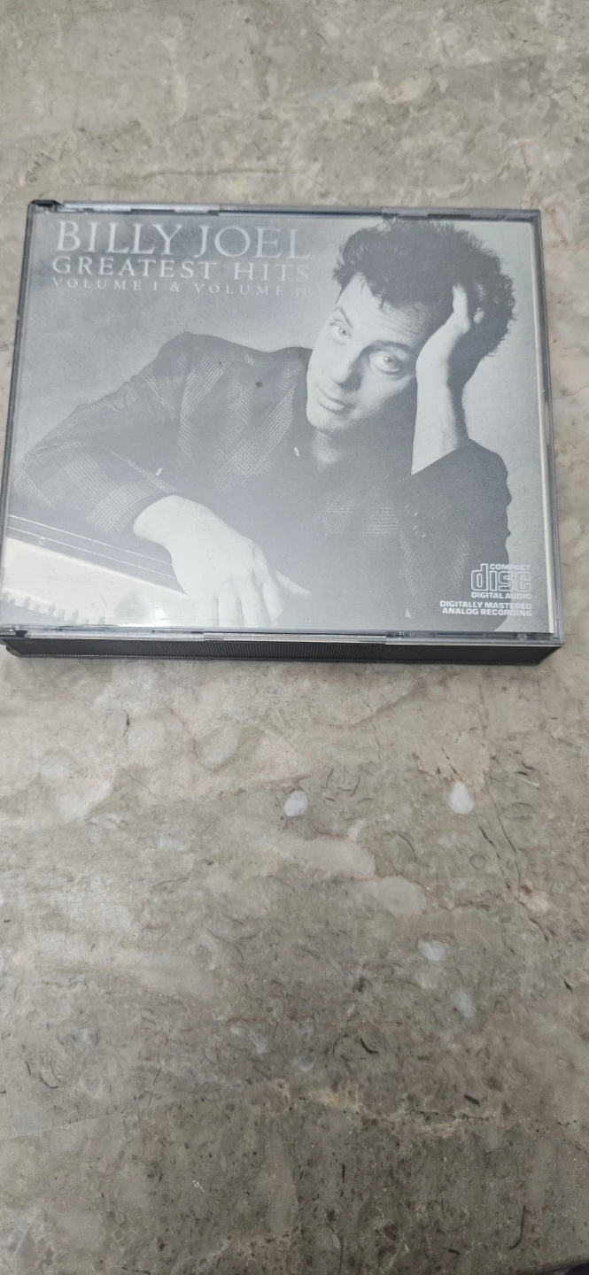 Billy Joel Greatest Hits Volume I & II CD compilation.