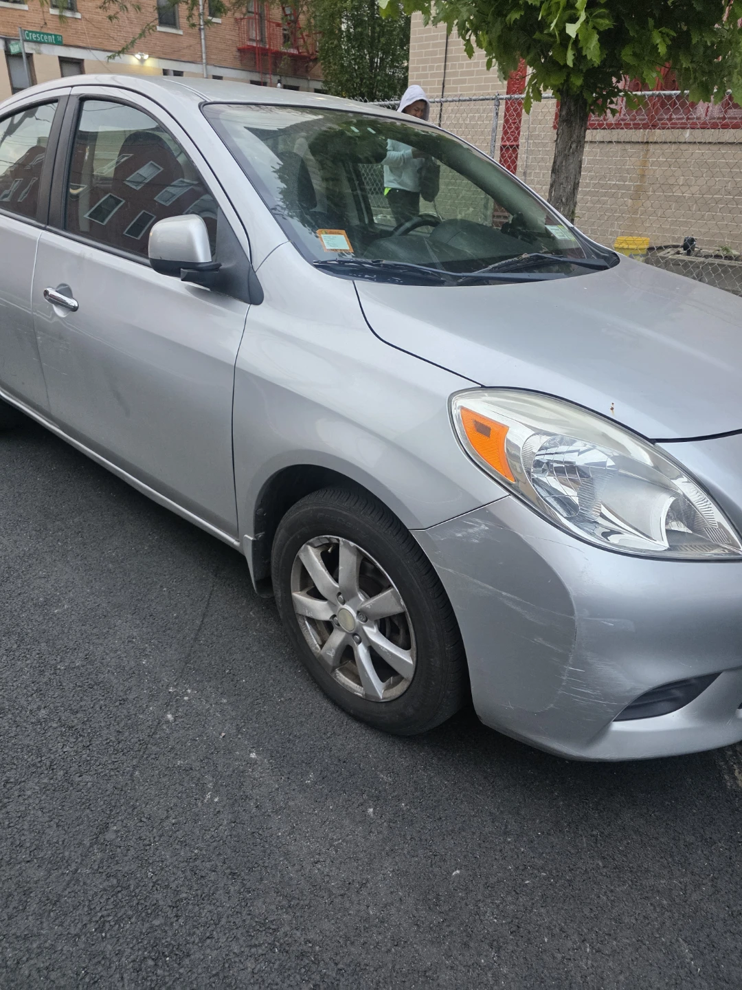 Silver Nissan Versa Sedan