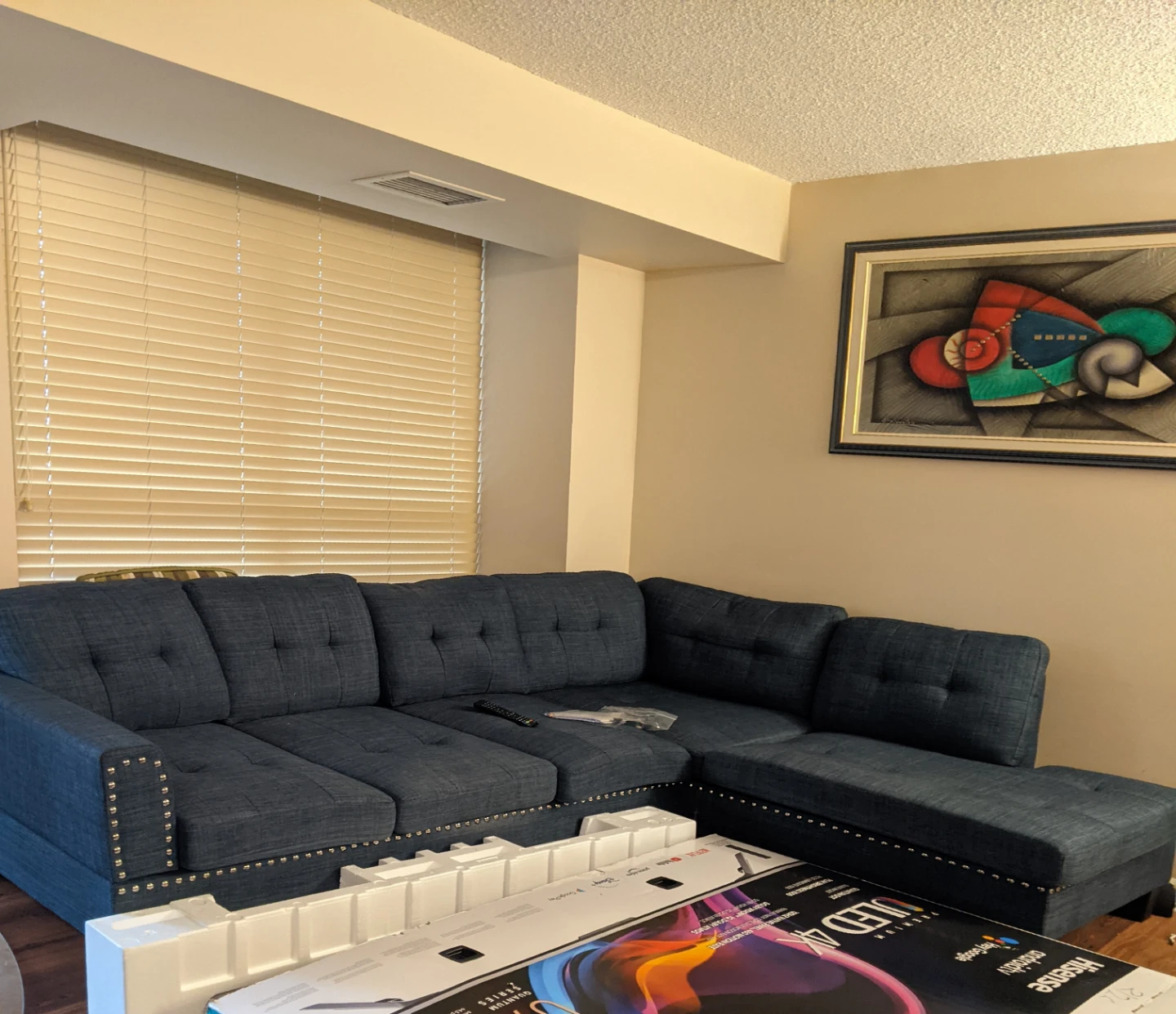 Blue Tufted Sectional Sofa with Studs