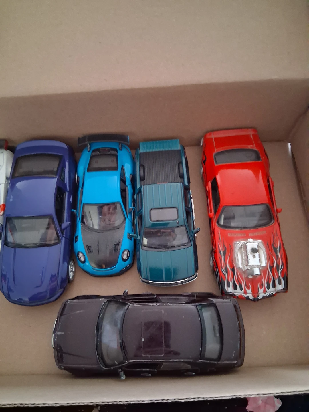 Royal Enfield toy motorcycle and assorted toy cars