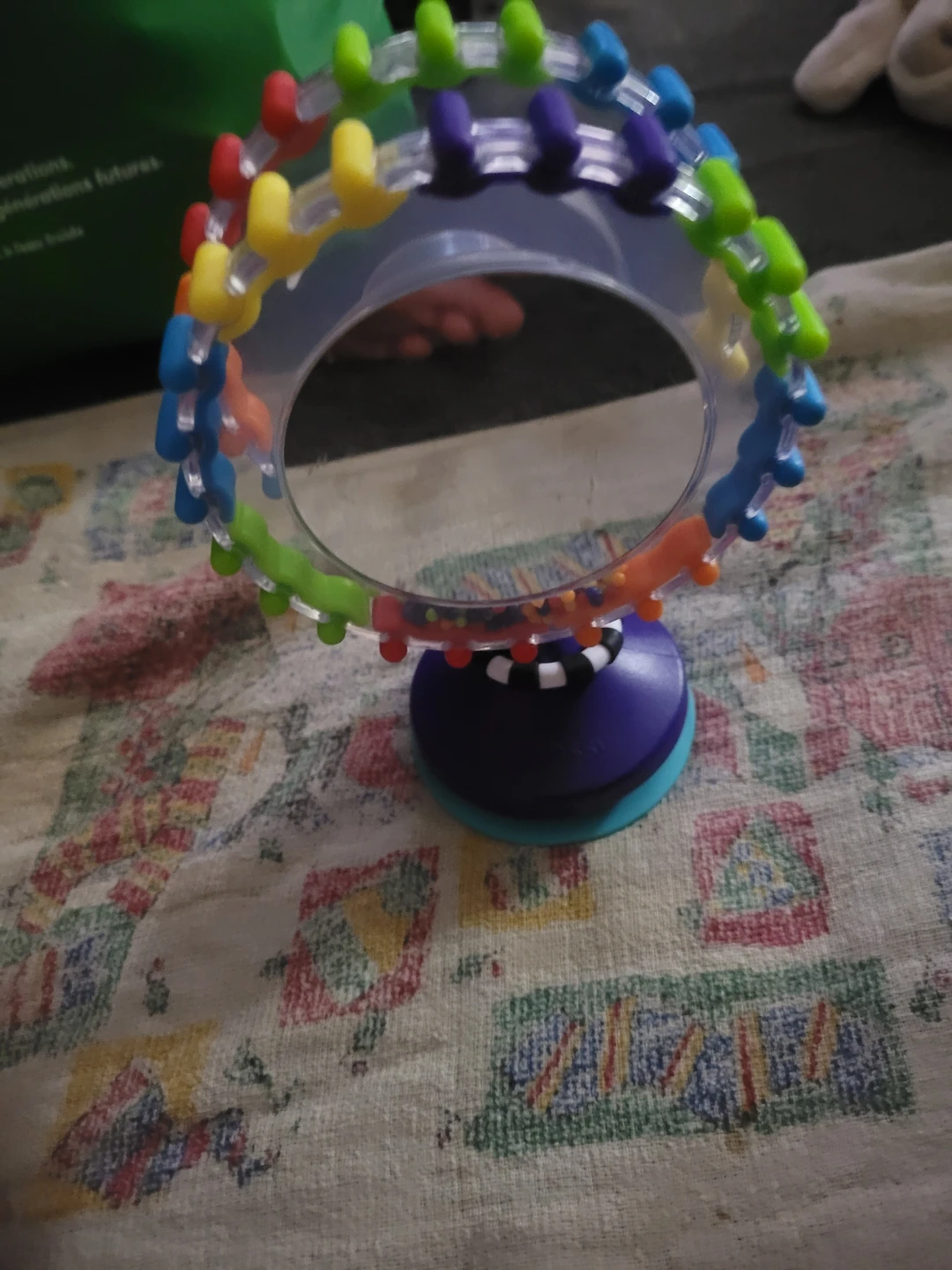 Sassy Wonder Wheel activity toy with a suction cup base