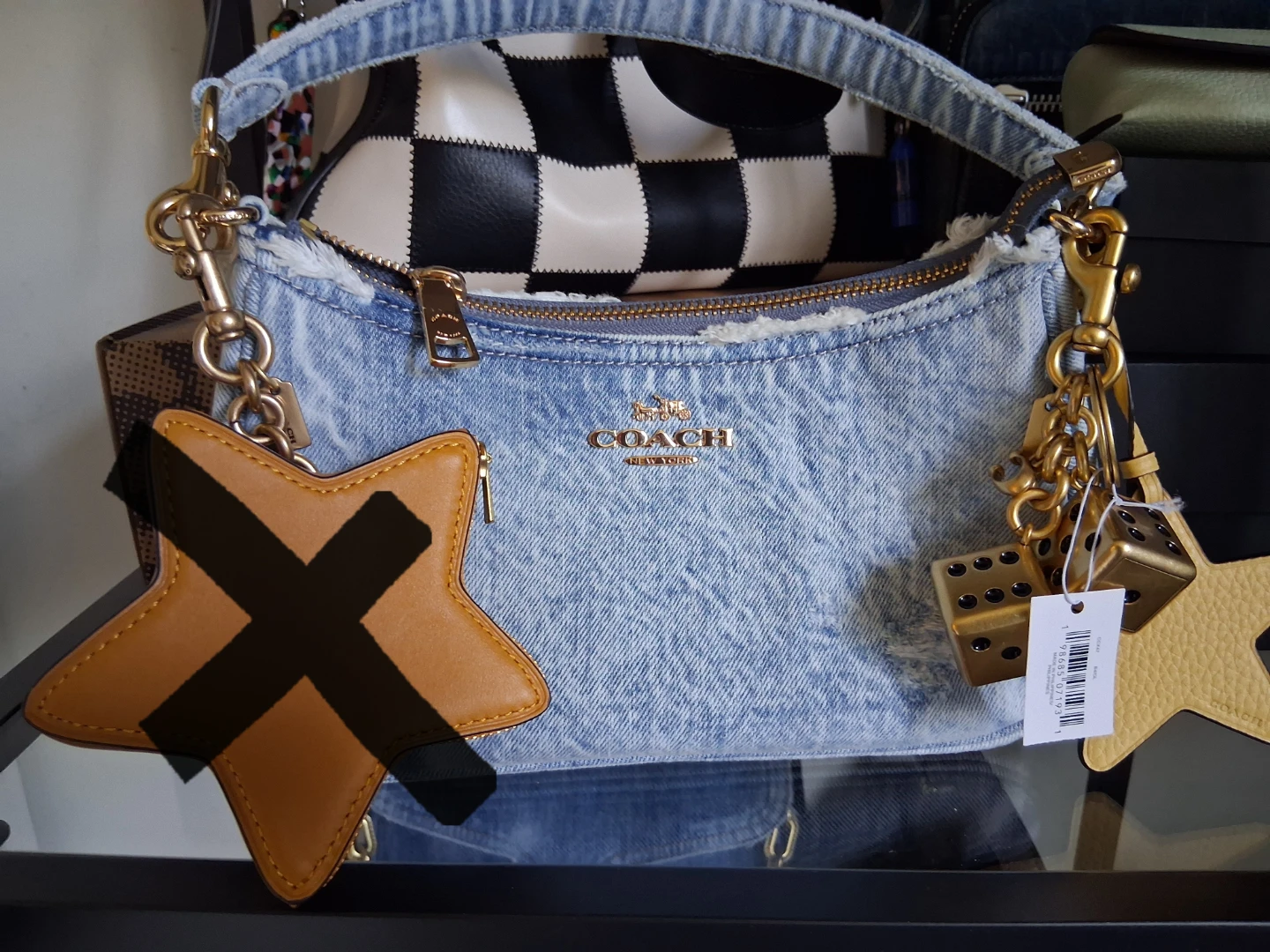 Coach denim terry with Star and Dice Bag Charm