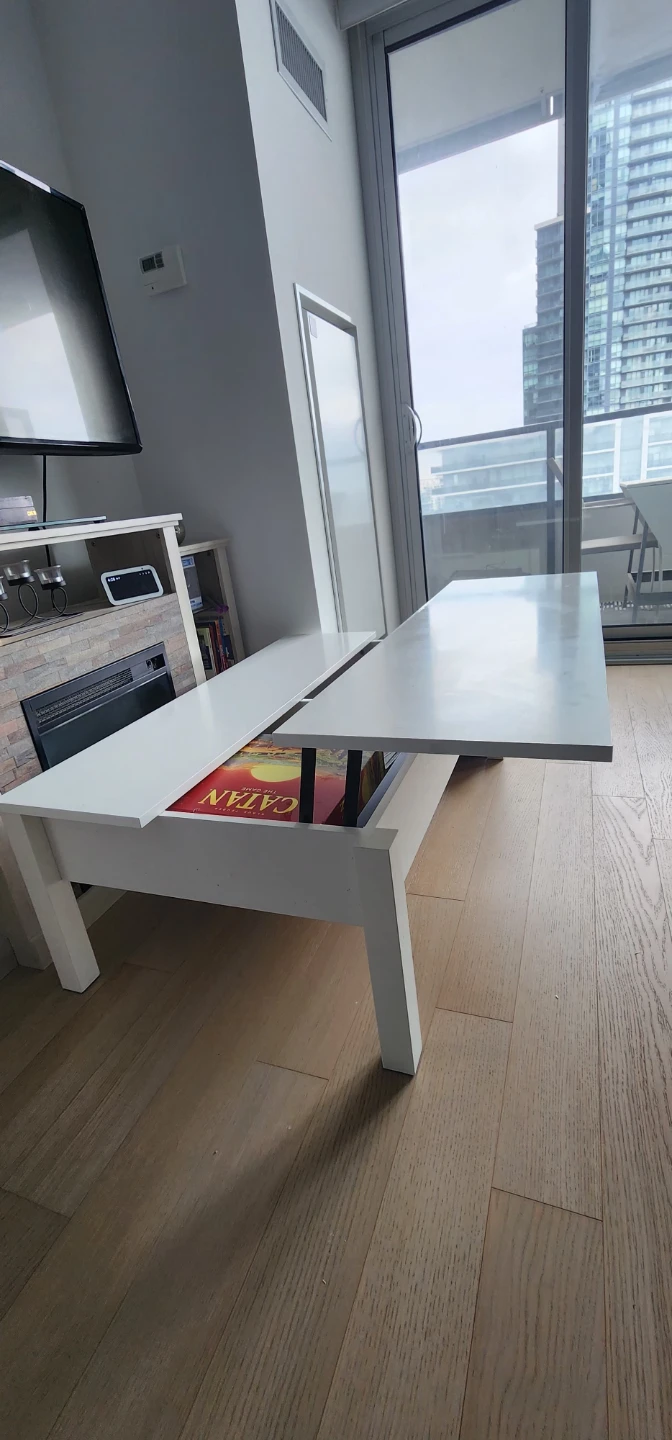 White lift-top coffee table with storage