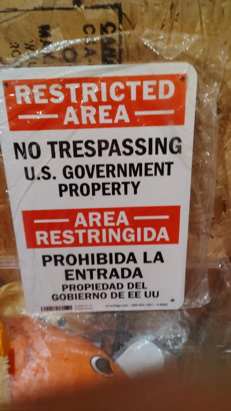 Restricted Area - No Trespassing U.S. Government Property Sign