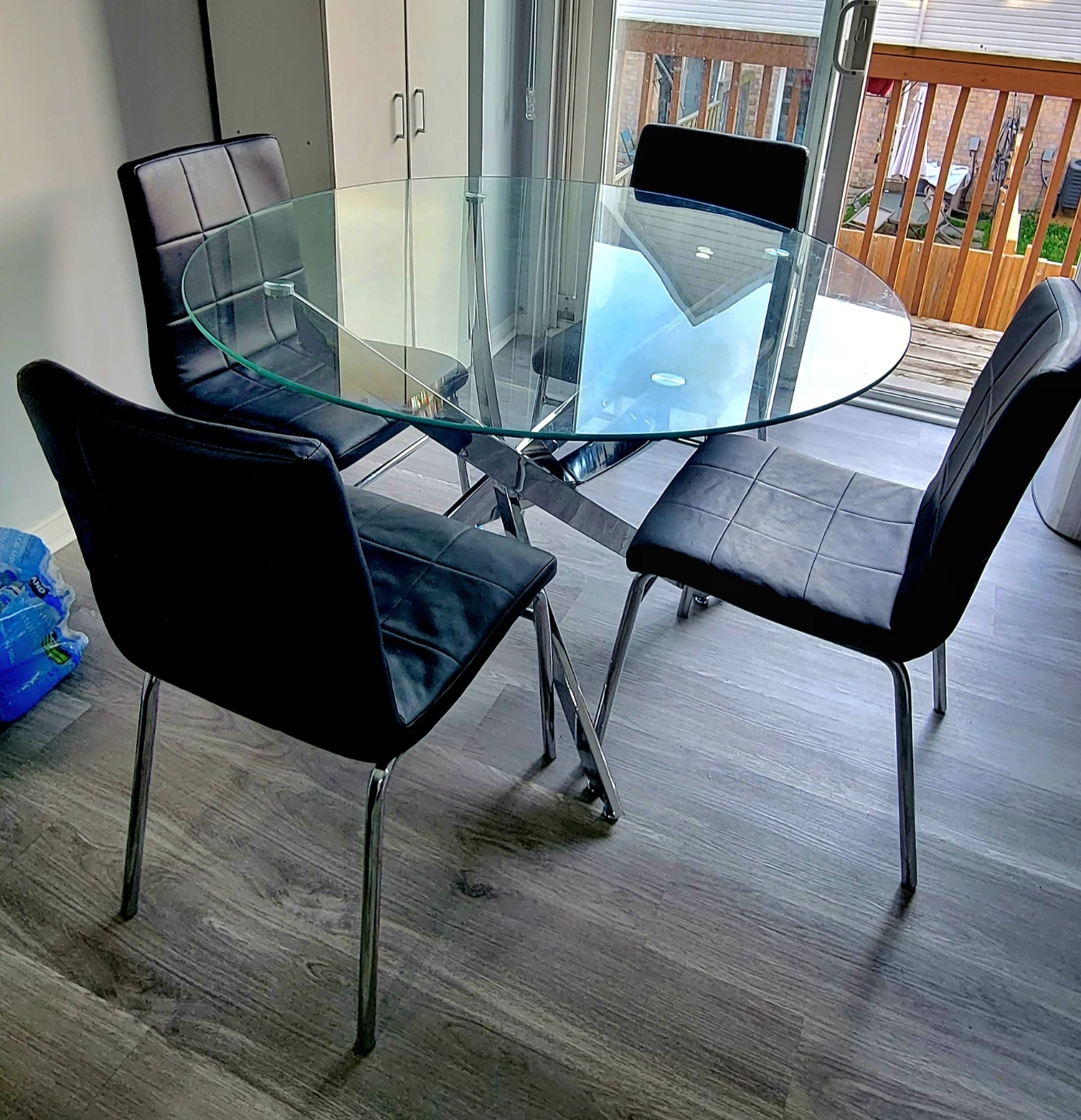 Glass Round Dining Table with 4 Black Chairs