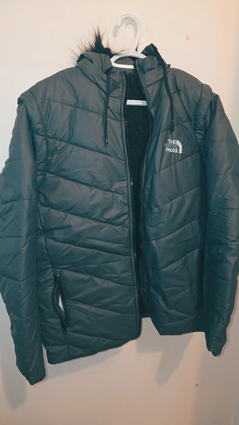 The North Face Puffer Jacket with detachable sleeves - photo 2